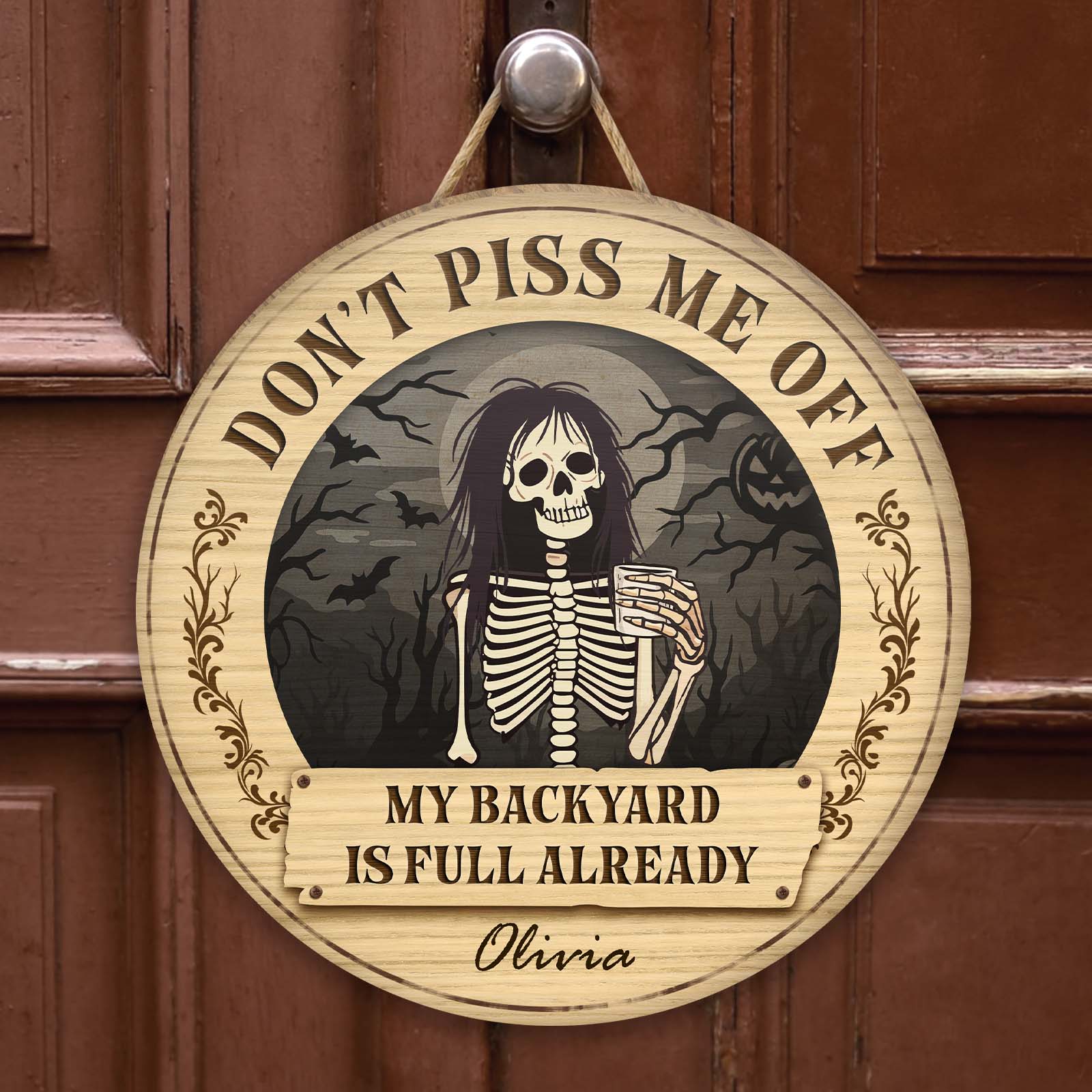 Personalized Halloween wooden door sign featuring a skeleton and bold text for festive decor