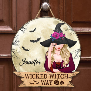 Personalized Halloween wooden door sign featuring a witch design with the name Jennifer and spooky bats