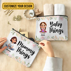 Personalized makeup bag with floral design, customizable for names like Mommy and Baby Things