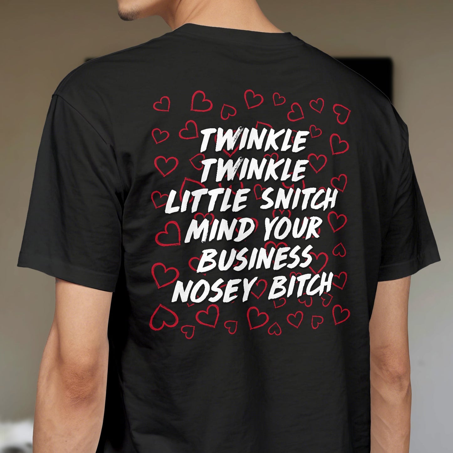 Black personalized mind your business t-shirt with bold white and red heart graphic text on back