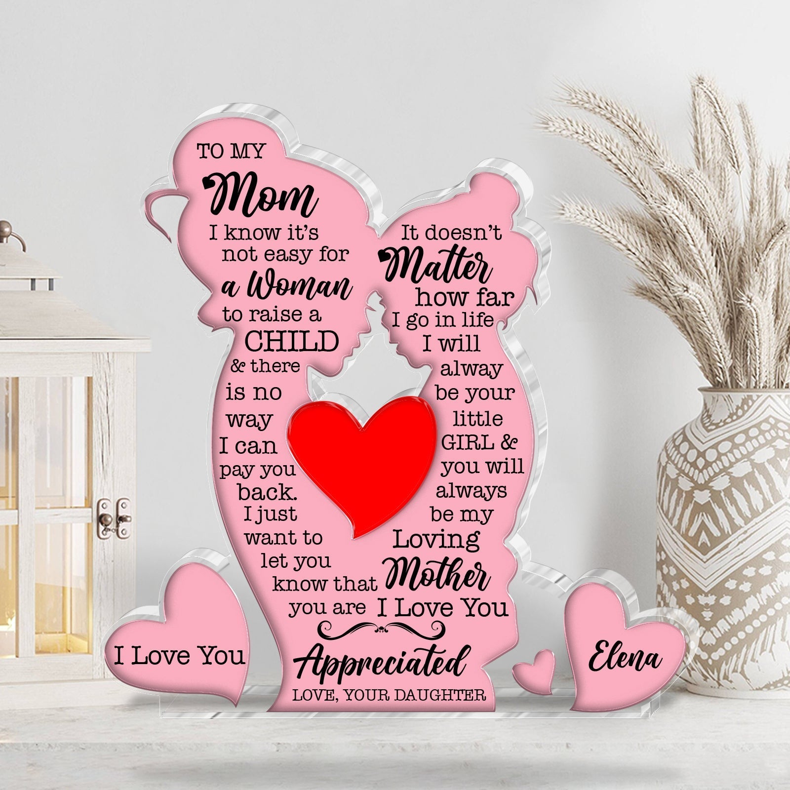 Personalized mom acrylic plaque with heartfelt message and pink accents showcasing love for mothers