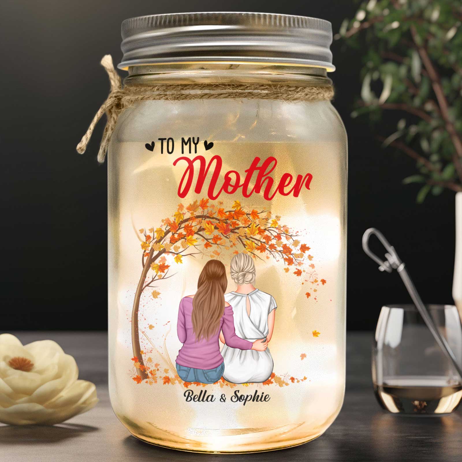 Personalized mom night light in a jar featuring two girls and fall leaves design for a heartfelt gift