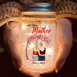 Personalized mom night light in a mason jar with a heartfelt message and decorative design