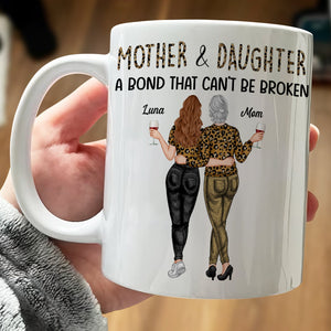 Personalized mother daughter mug featuring a design with two women holding drinks and the text about their bond