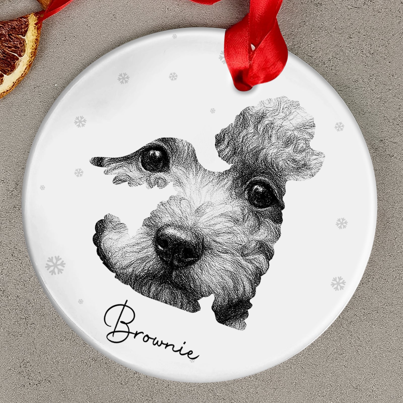 Personalized pet loss ornament featuring a custom illustration of a dog named Brownie