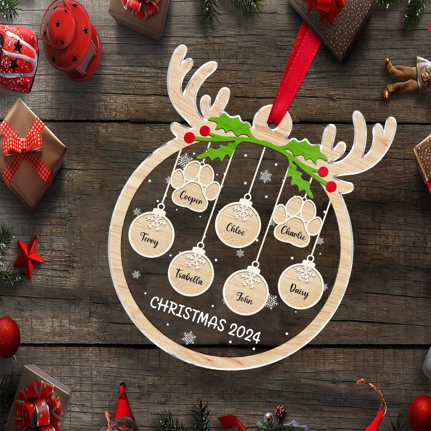365Gifty personalized pet paw Christmas ornament with reindeer design and custom pet names hanging on red ribbon