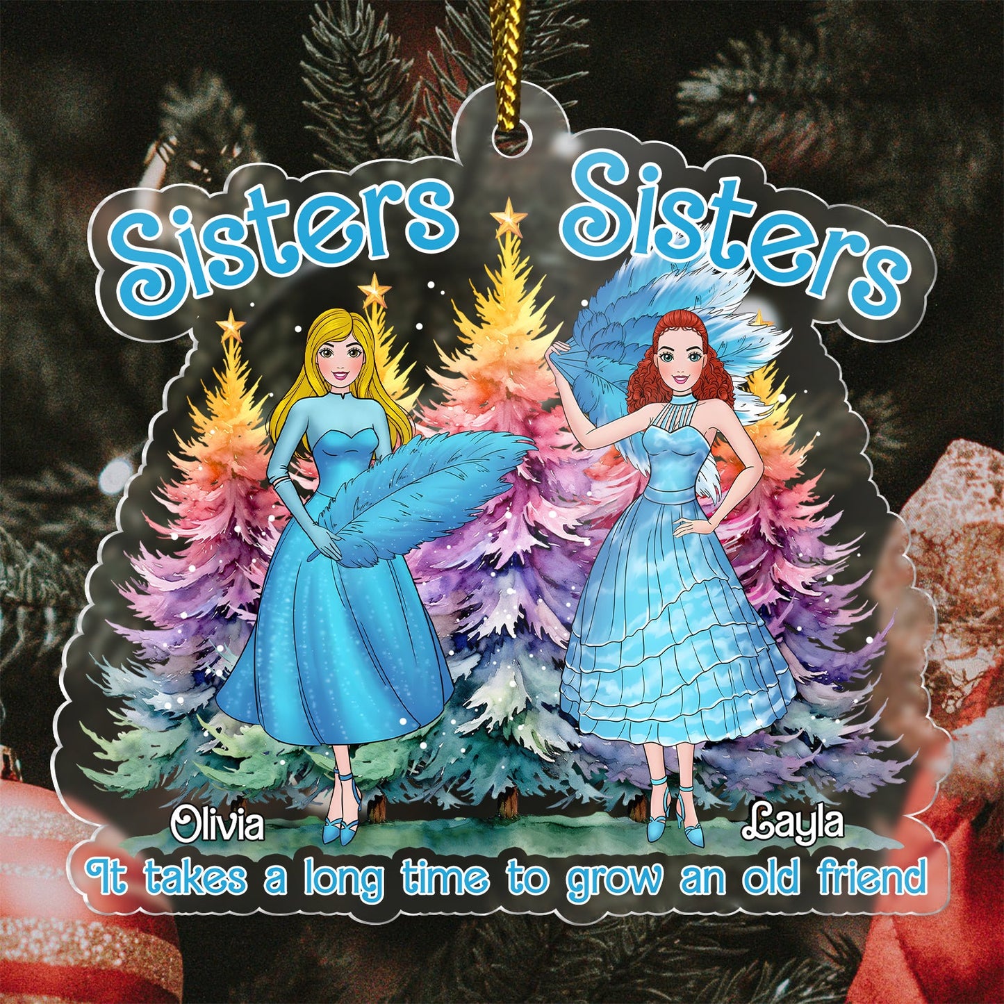 Personalized sisters Christmas ornament with two women in blue dresses and colorful Christmas trees