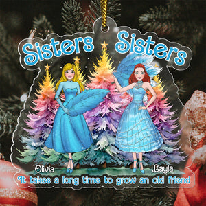 Personalized sisters Christmas ornament with two women in blue dresses and colorful Christmas trees