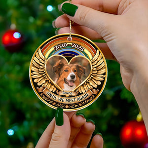 Hands holding 365Gifty personalized pet memorial ornament with dog photo in heart gold wings and 2020 to 2025