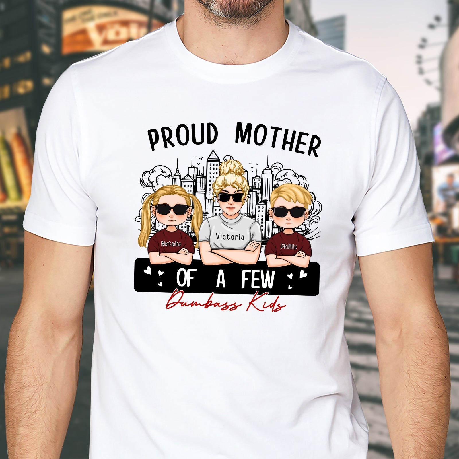 White T-shirt featuring a design that says proud mom of a few dumbass kids with cartoon characters