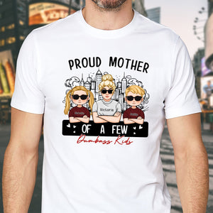 White T-shirt featuring a design that says proud mom of a few dumbass kids with cartoon characters