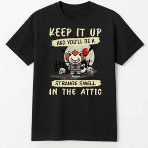 Black personalized Halloween cat shirt with creepy clown cat holding red balloon over skulls and tombstones