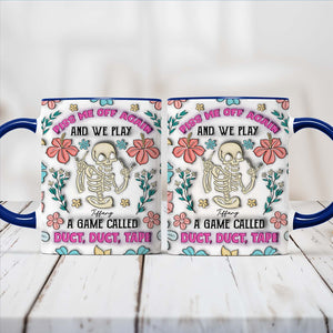 personalized halloween mug showing two white mugs with blue handles floral skeleton artwork and humorous duct tape game text