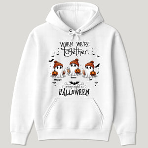 White hoodie featuring personalized Halloween ghost shirt design with three named ghosts in orange hats holding pumpkins