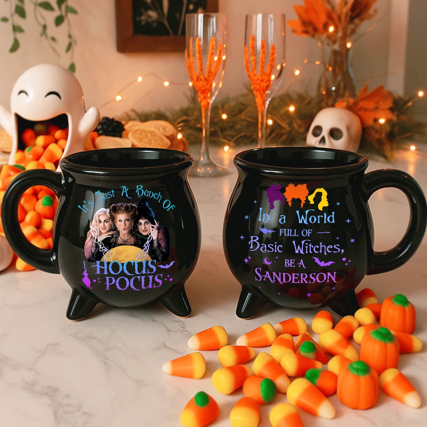 Hocus Pocus Halloween cauldron mug set showing two black cauldron mugs with Sanderson sisters design and candy