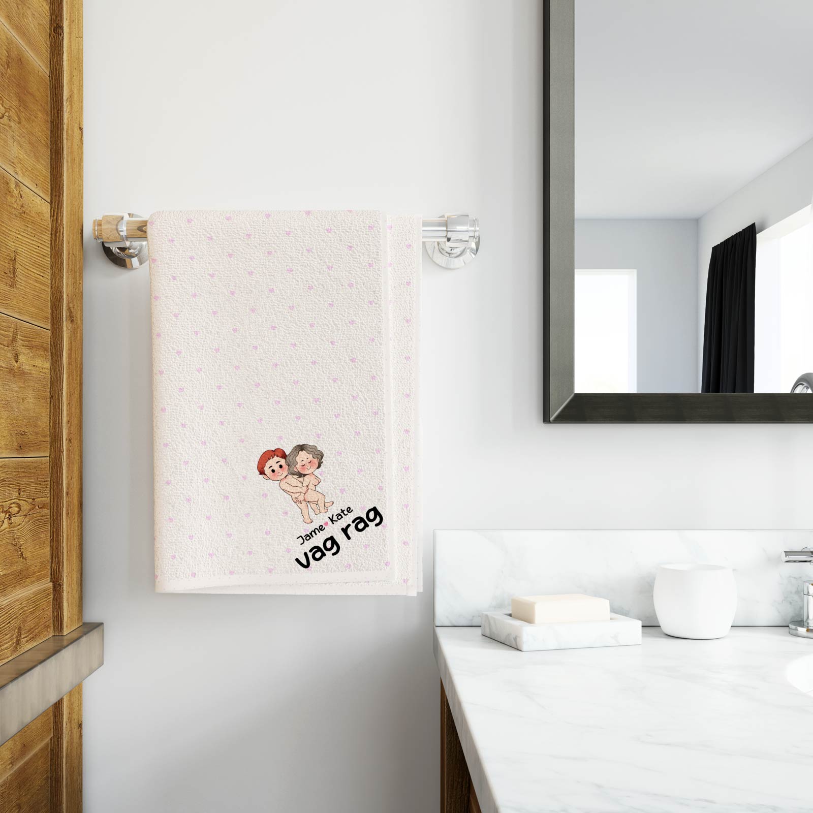 Personalized Beach Towel hanging on bathroom rack with cute custom cartoon couple design and name