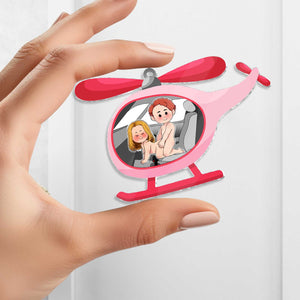 Unique shaking keychain for couples featuring a playful helicopter design with cartoon lovers
