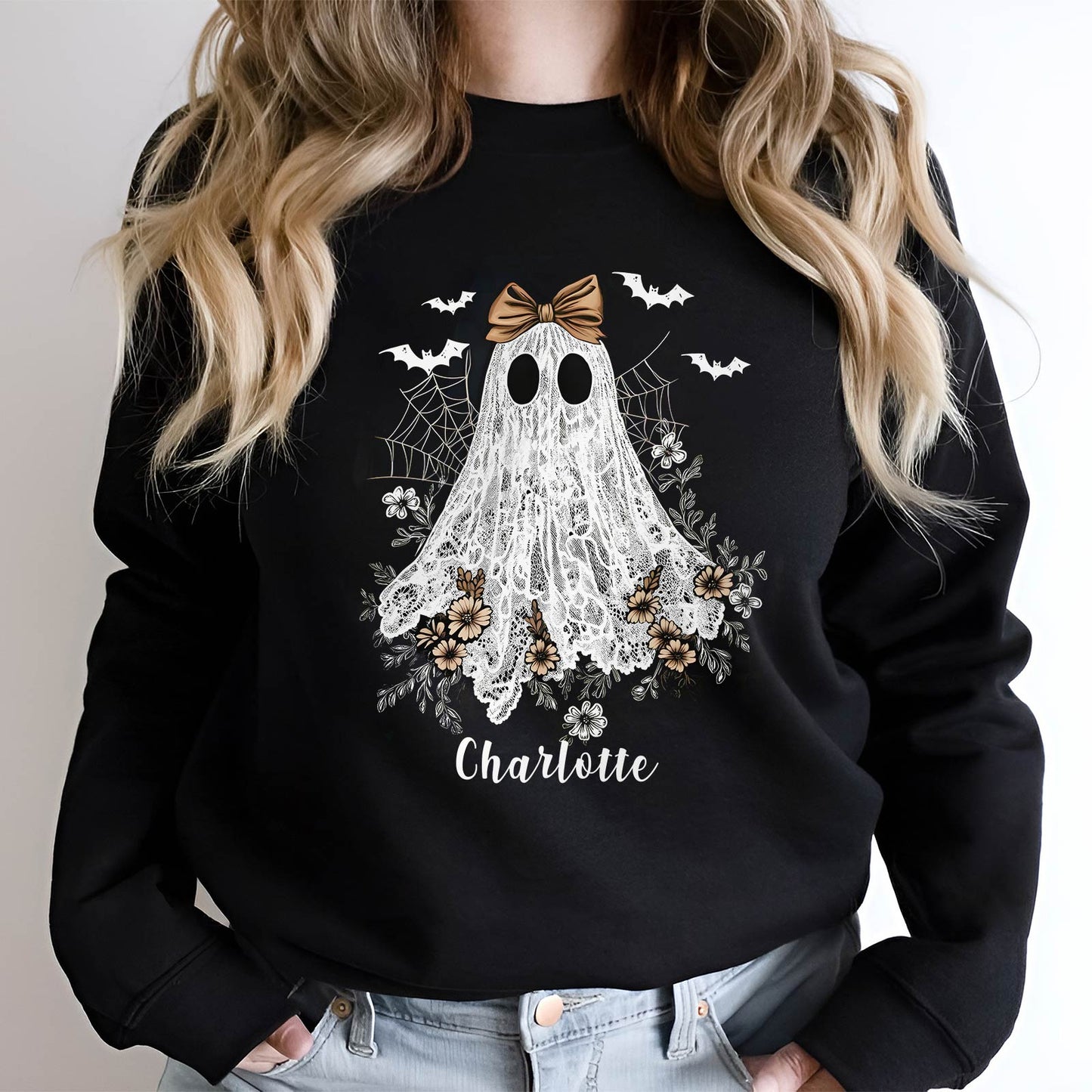 Black personalized Halloween ghost shirt with lace ghost design, bats, flowers, and the name Charlotte