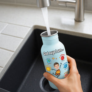 365Gifty blue water bottle for kids with motivational design being filled with water at kitchen sink