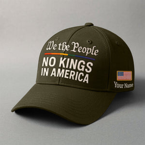 We the People embroidered cap in olive green featuring customizable name and American flag patch