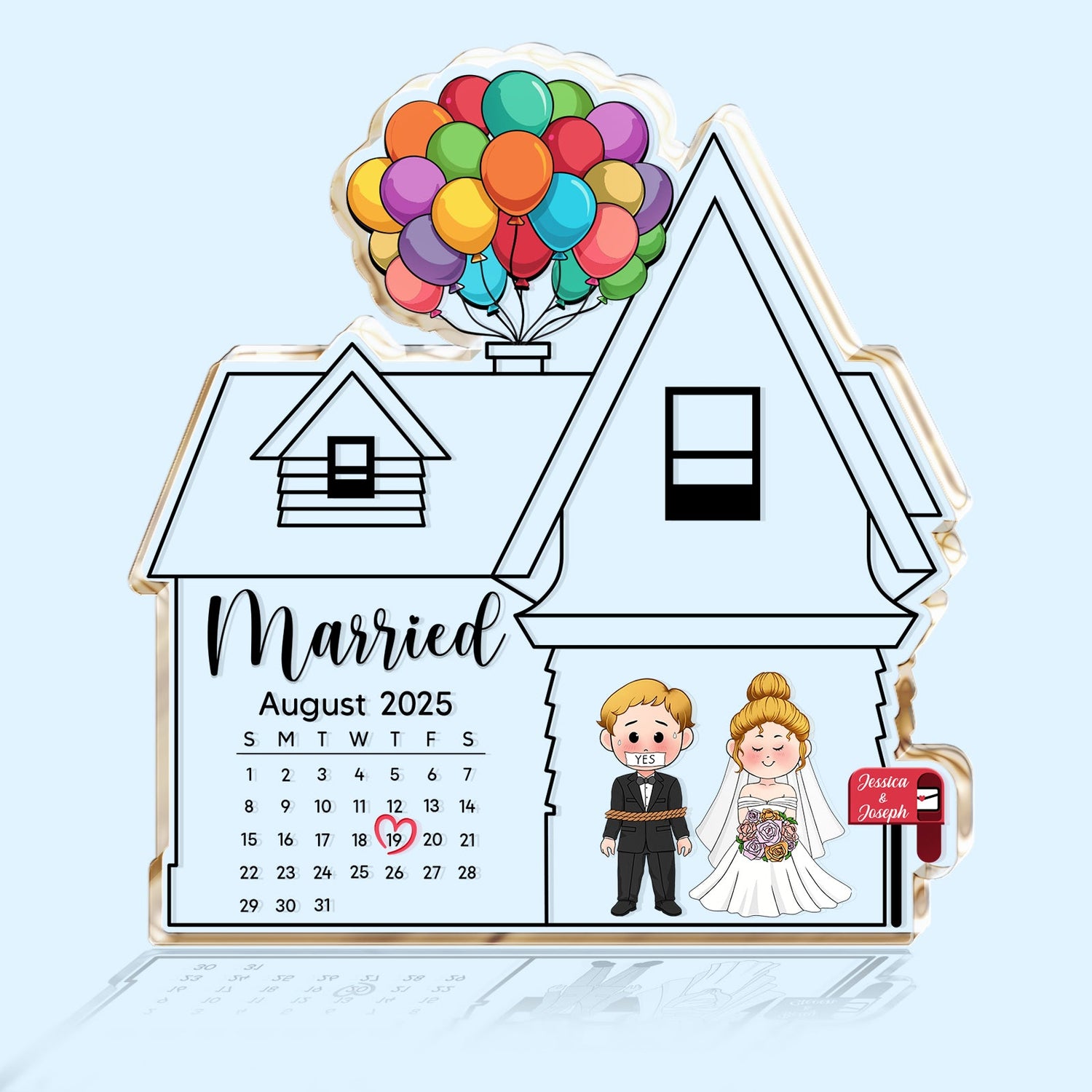 Personalized acrylic plaque shaped like a house with a wedding calendar and cartoon bride and groom