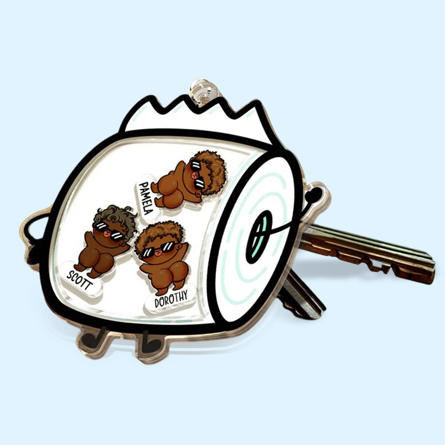 Unique personalized keychains featuring cute character designs attached to house keys