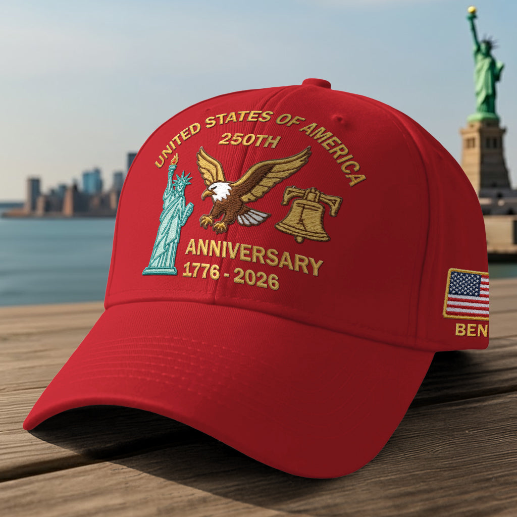 Red cap celebrating the 250th anniversary embroidered cap with designs of the Statue of Liberty and an eagle
