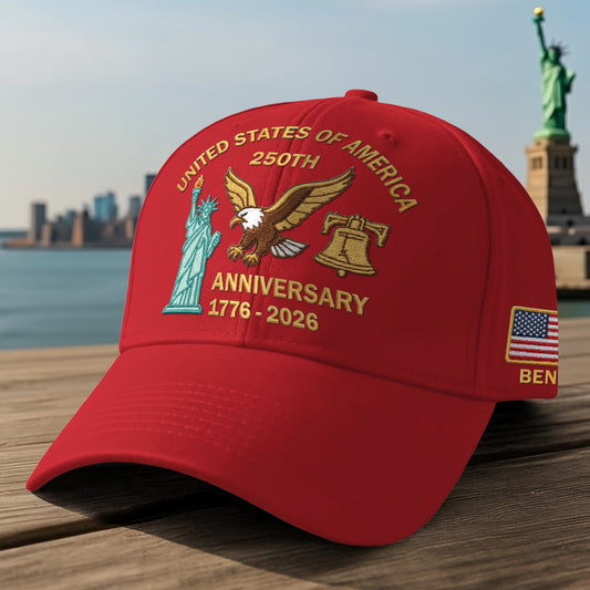 Red cap celebrating the 250th anniversary embroidered cap with designs of the Statue of Liberty and an eagle