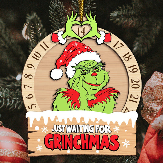 3-layered Grinch ornament for Christmas with Grinch in Santa hat and Just Waiting for Grinchmas text