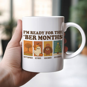 White ceramic beer mug with autumn and holiday themed 'Ber Months' design for September to December