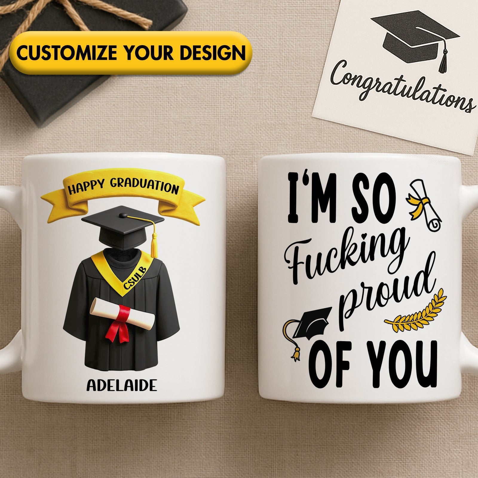 Two white ceramic custom graduation gift mug set showing graduate cap and gown design and bold proud message