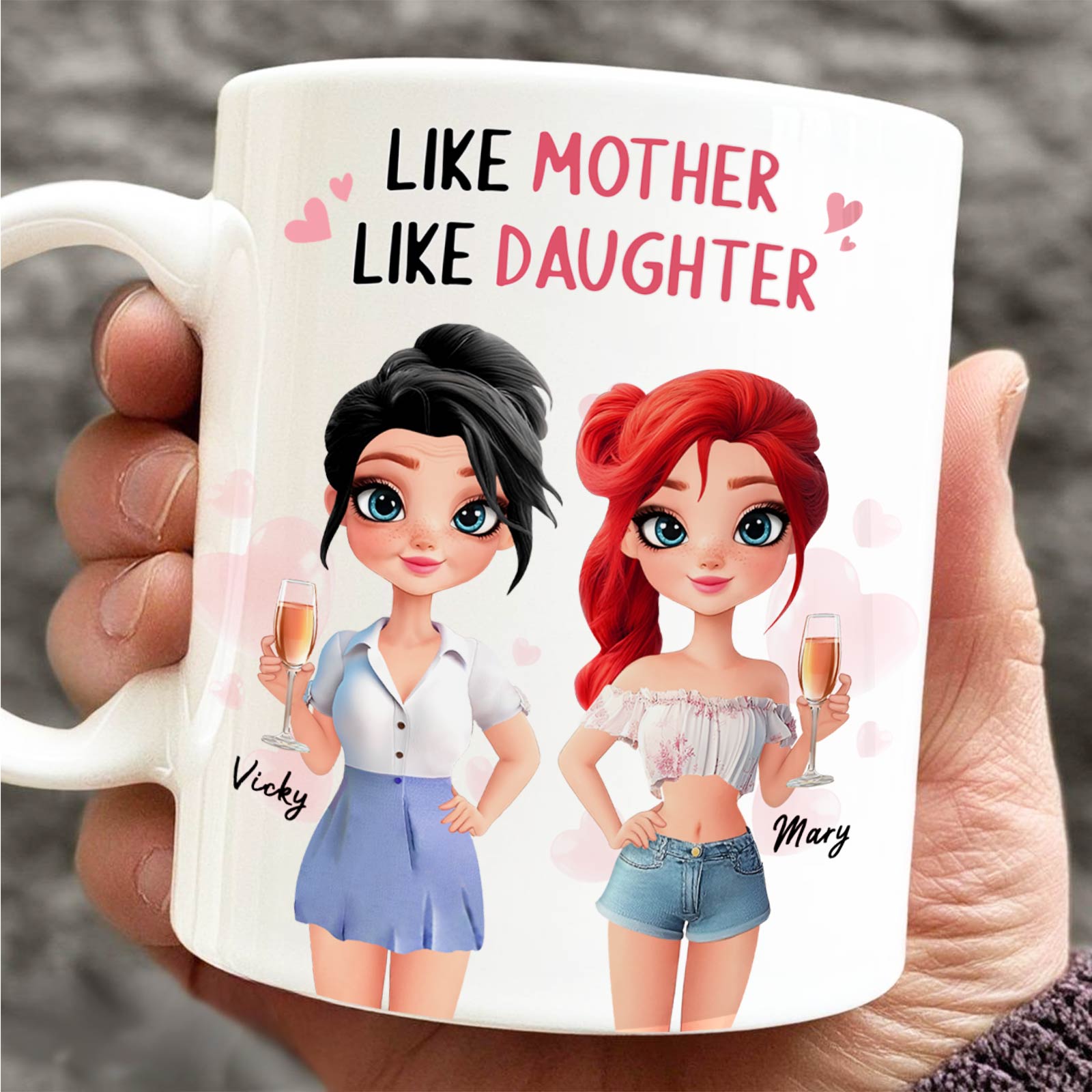 White ceramic custom like mother like daughter mug showing cartoon mother Vicky and daughter Mary holding drinks