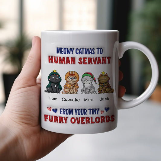 Hand holding 365Gifty custom Meowy Catmas pet mug featuring four cartoon cats and festive holiday text