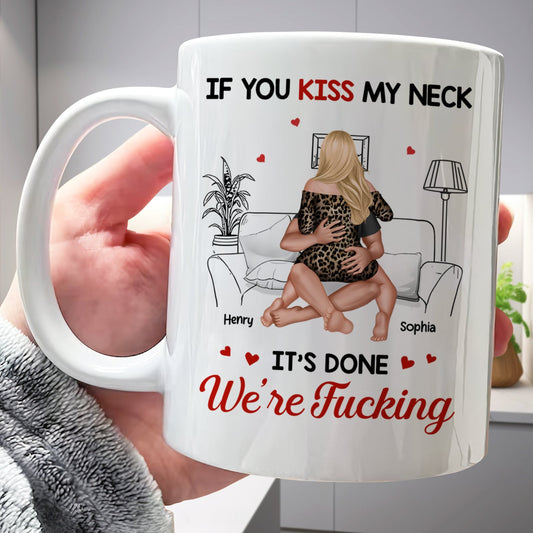 White custom romantic coffee mug with couple on couch labeled Henry and Sophia and text If you kiss my neck its done Were Fucking