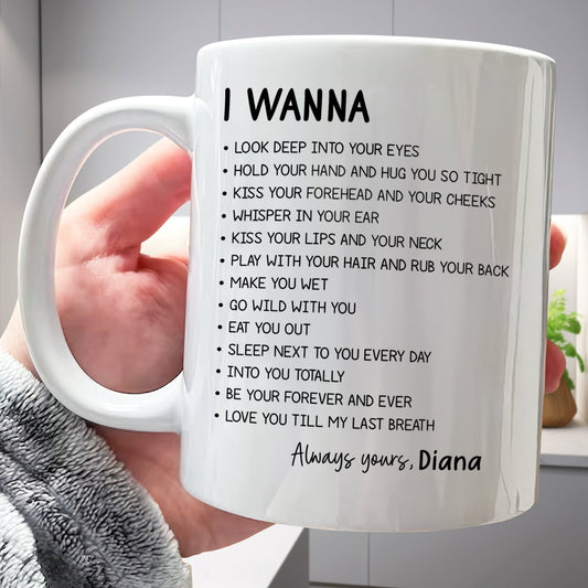 White personalized ceramic custom romantic mug for couples held in hand with I WANNA love list and name Diana