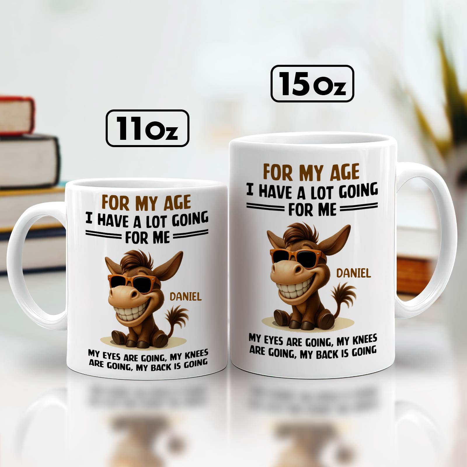 Two white 11oz and 15oz ceramic mugs with smiling cartoon donkey personalized Daniel for my age I have a lot going for me mug