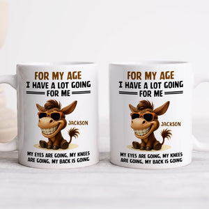 365Gifty white ceramic mug set with smiling sunglass donkey and Jackson name featuring for my age I have a lot going for me mug