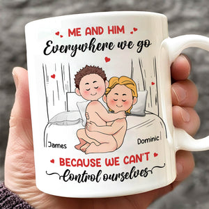 White ceramic me and him everywhere we go mug showing cartoon couple cuddling on bed with custom names