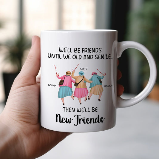 White ceramic personalized best friends mug with three women in colorful dresses holding hands with printed names and quote