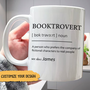 personalized booktrovert mug white ceramic mug with BOOKTROVERT definition held in hand customizable gift