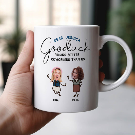 Hand holding white ceramic personalized coworker mug showing custom caricature faces Tina and Kate and Goodluck message