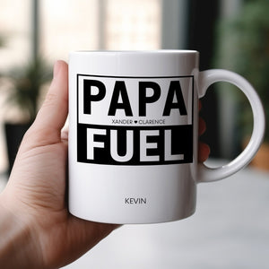 White ceramic personalized dad mug reading PAPA FUEL with custom name Kevin held in hand