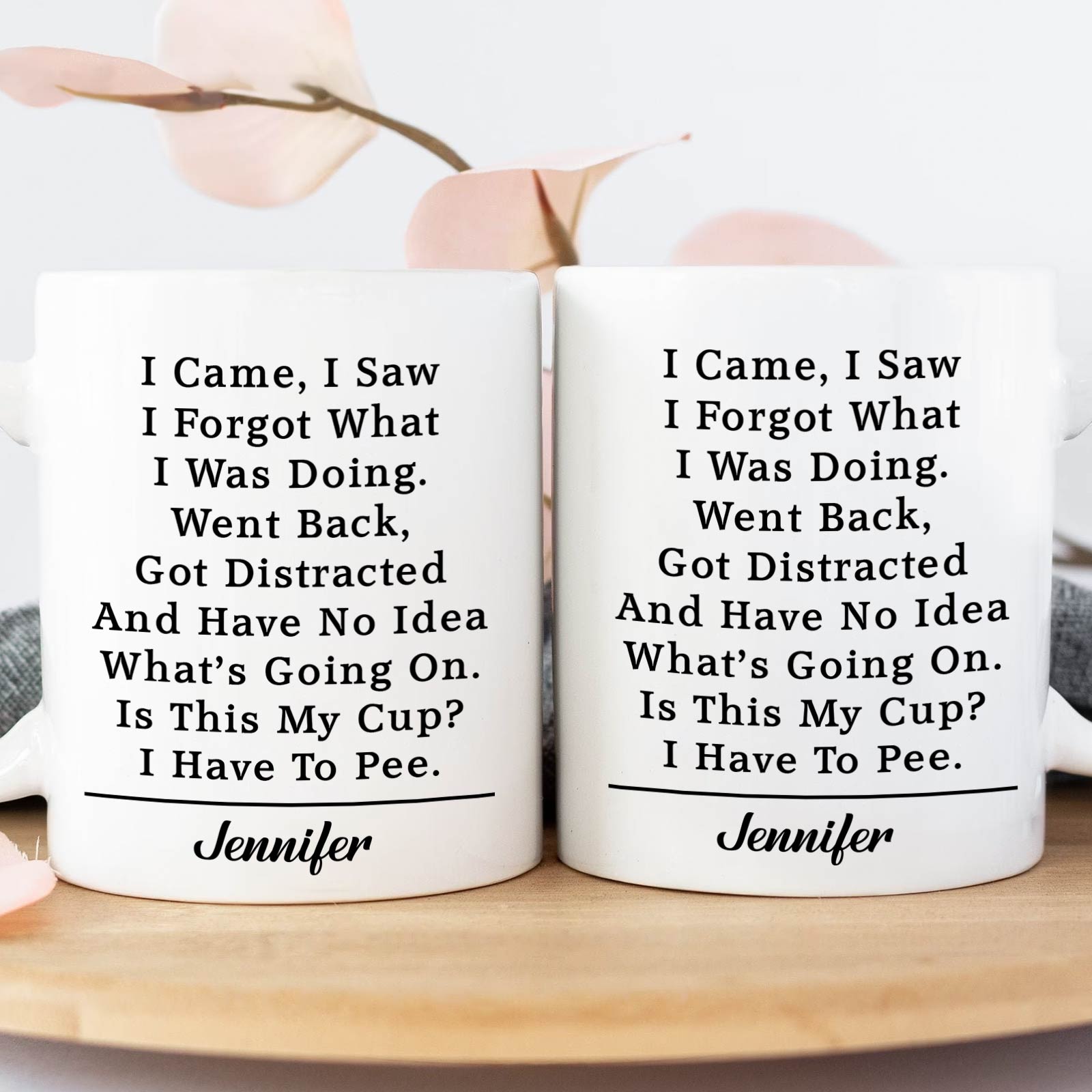 Two white ceramic personalized funny mug pair with humorous poem and scripted name Jennifer on wood tray