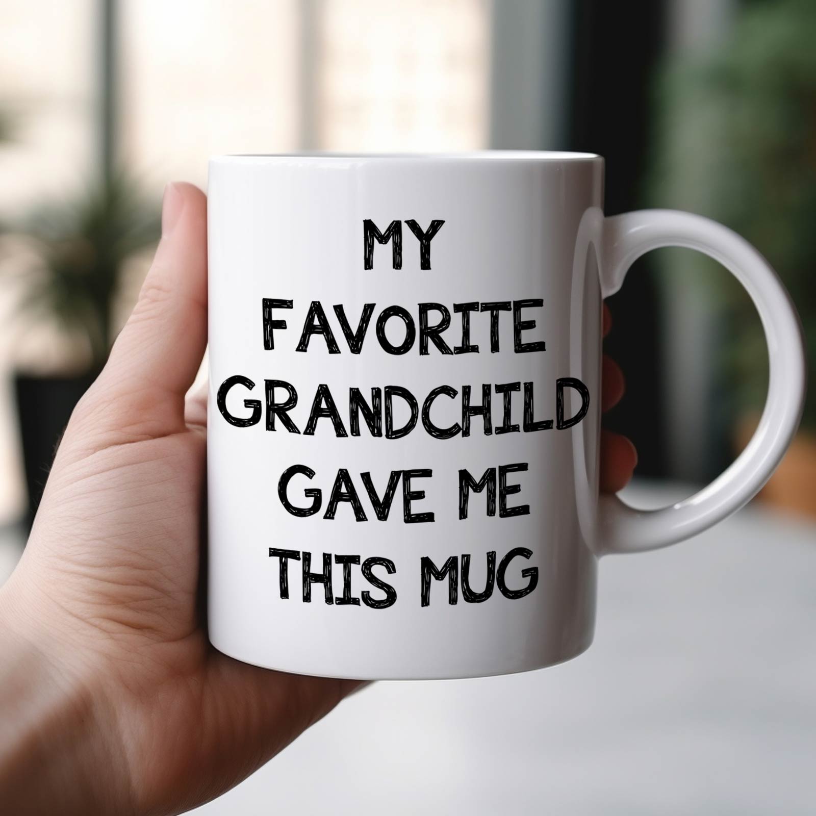 White ceramic mug reading My Favorite Grandchild Gave Me This Mug ideal unique custom mug for grandparents