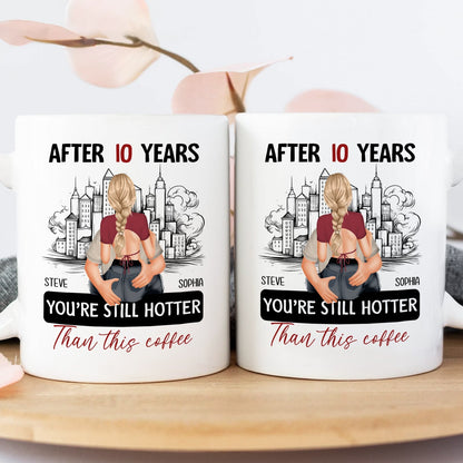 After 10 years still hotter than coffee mug featuring a couple hugging with city skyline background