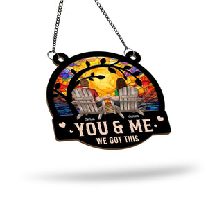 Personalized couple suncatcher ornament with sunset design and custom names holding hands on chairs