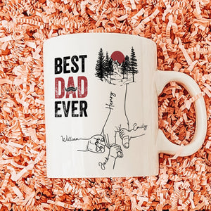 Ceramic coffee mug featuring the phrase best dad ever gift mug with a nature design and family names