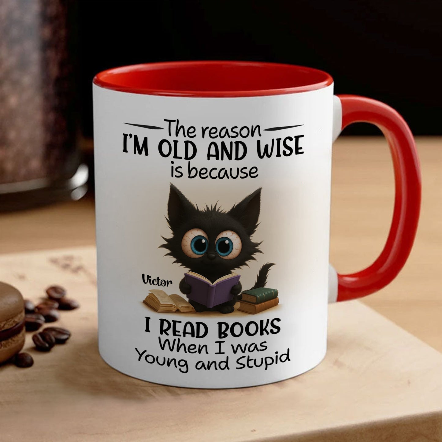 Red rim ceramic mug with wide eyed black cat reading books and quote name Victor funny personalized accent mug for bookworms