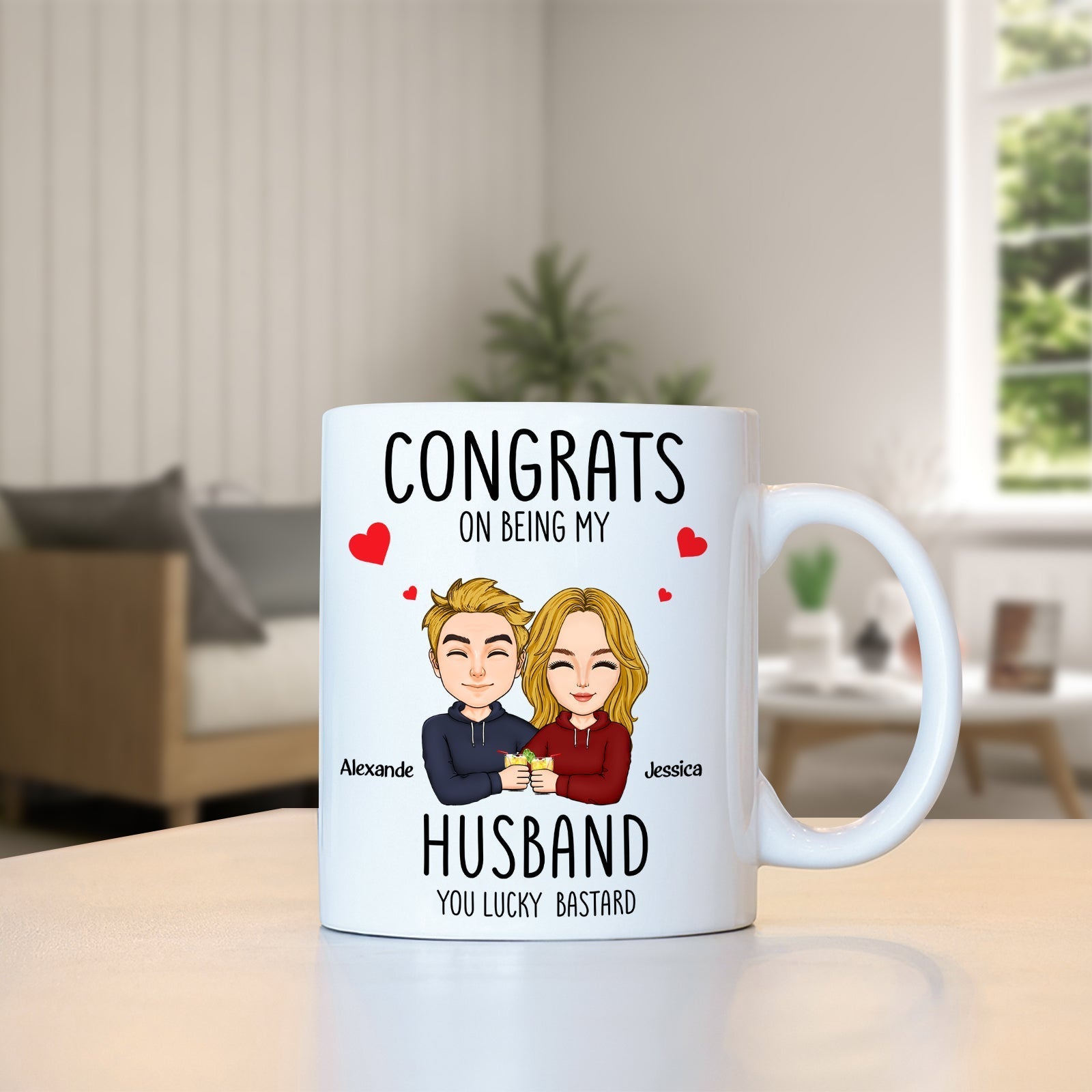 White congrats on being my husband mug with cartoon couple and hearts on a table in living room