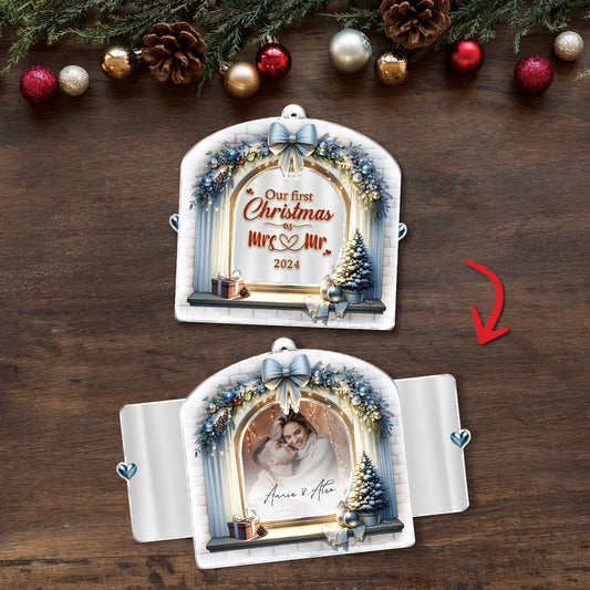 Personalized first Christmas ornament for couples featuring a winter wreath, blue bow, Christmas tree, and custom photo display